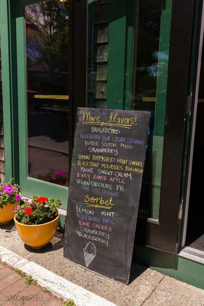 mount desert island ice cream exterior with sign listing flavors