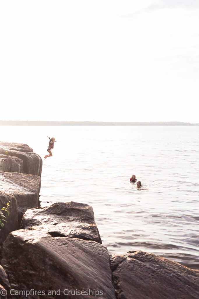 cliff jumping at blueberry hill at nutimik lake manitoba