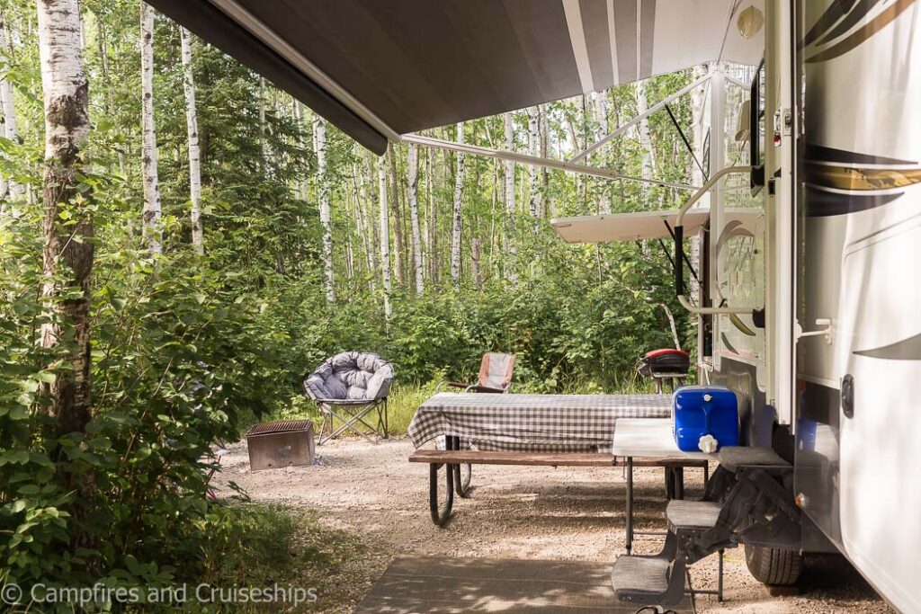 campsite with trailer at nutimik lake in whiteshell provincial park