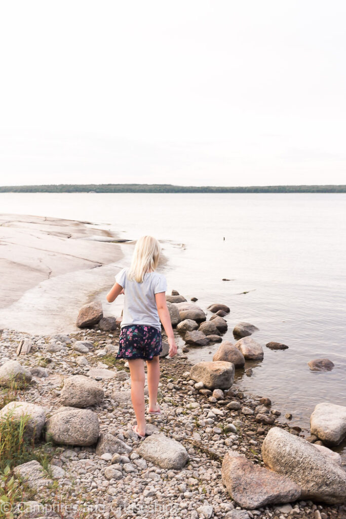 walking on the rocks at nutimik lake manitoba