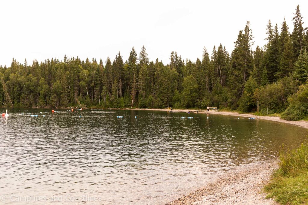 deep bay beach in clear lake riding mountain national park